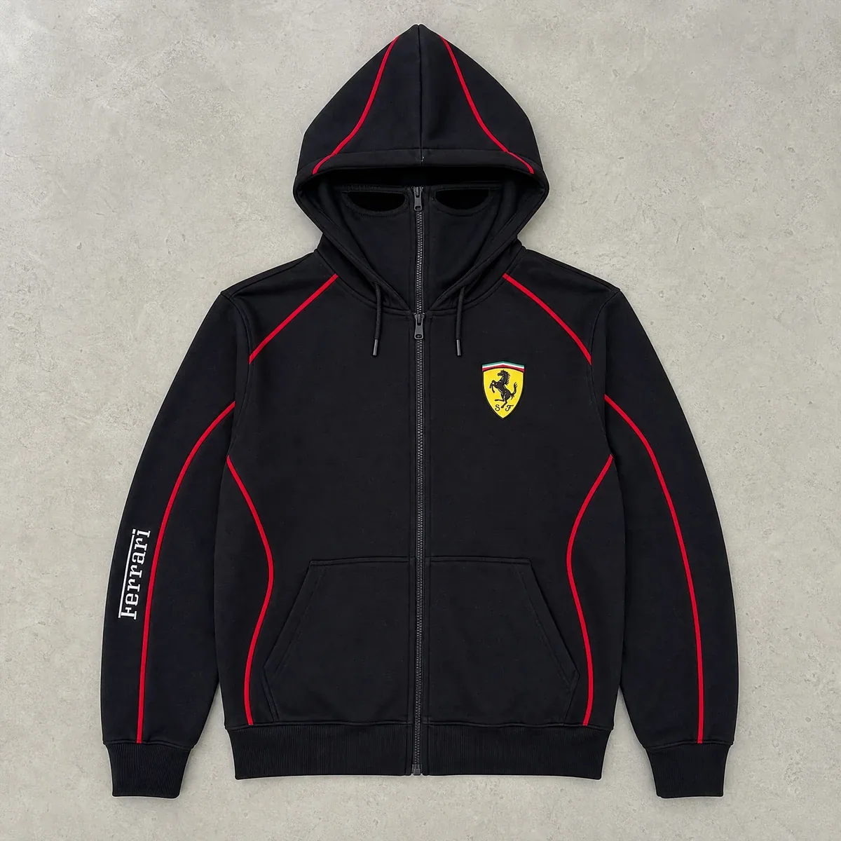 Ferrari Edition flat lay showing the full face zip and built in eye opening